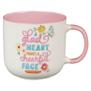 A Glad Heart Makes a Cheerful Face Pink Ceramic Mug - Proverbs 15:13